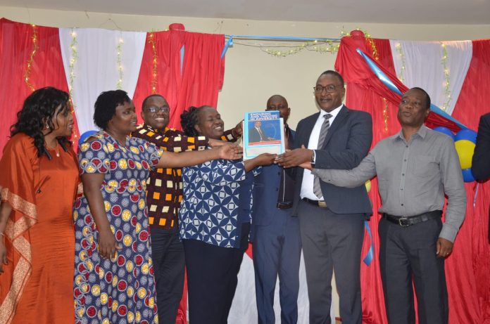 Civil Servant Marks Retirement with Inspiring Book Launch